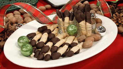 PHOTO: Chocolate-Dipped Pecan Shortbread Logs are shown here.