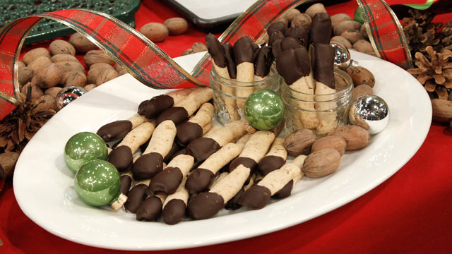 PHOTO: Chocolate-Dipped Pecan Shortbread Logs are shown here.