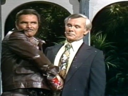 VIDEO: Burt Reynolds and Johnny Carson spray whipped cream at each other.