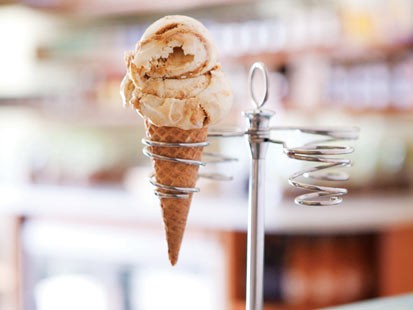 Sweet Cream and Sugar Cones' brown sugar ice cream with a ginger-caramel swirl is shown here.