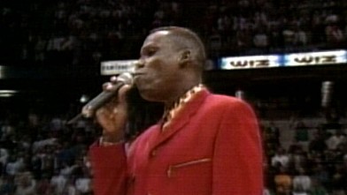 PHOTO: Carl Lewis sang the National Anthem at a Nets game in 1993.