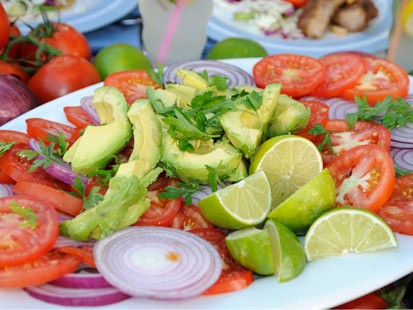 Emeril's Avocado, Tomato and Vidalia Onion Salad is seen here in this undated photo.