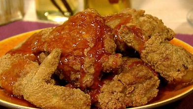 PHOTO: Michael Symon's fried chicken with sriarcha honey is shown here.
