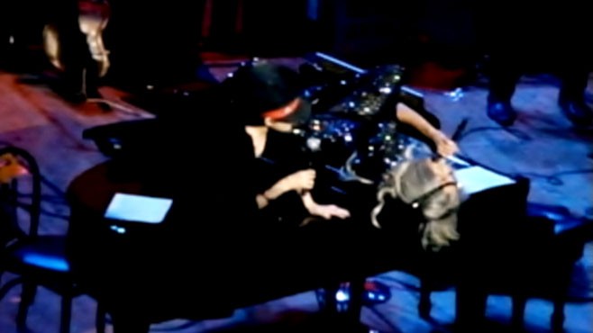 VIDEO: Lady Gaga joins Yoko Ono atop a piano during concert for John Lennons birthday.