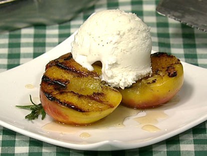 Carla Hall's grilled peaches with rosemary honey are shown here.