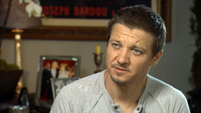 PHOTO: Actor Jeremy Renner talks with