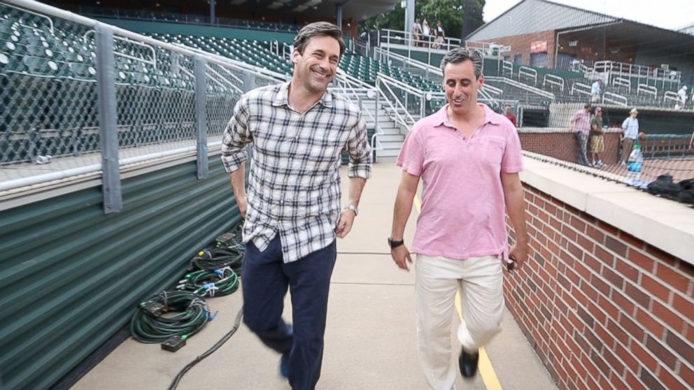 Both actor Jon Hamm, left, who plays sports agent JB Bernstein, right, in "Million Dollar Arm" are shown here on set.