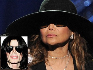 PHOTO Two British tabloids quote LaToya Jackson as saying she believes her brother Michael Jackson was murdered as part of a conspiracy to steal his fortune.