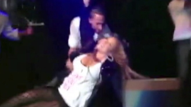 Video: Mariah Carey falls during Singapore concert.