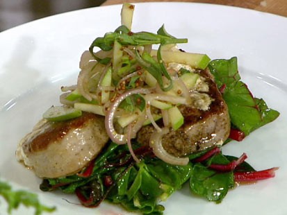 PHOTO: Michael Symons pork tenderloin with greens and apples is shown here.