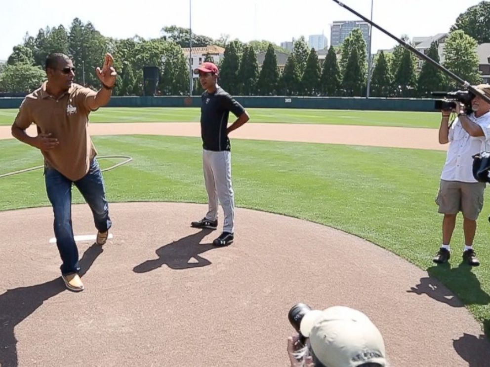 PHOTO: Rinku Singh, left, one of the subjects of Million Dollar Arm, is played by Life of Pis Suraj Sharmal, right. Shown here, Singh offers Sharmal some pitching tips.