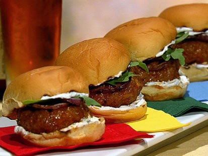 Michael Symon's spicy sausage sliders are shown here.