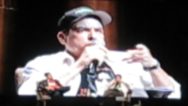 VIDEO: Charlie Sheen closes Toronto show by toasting ashes of an audience member's husband.