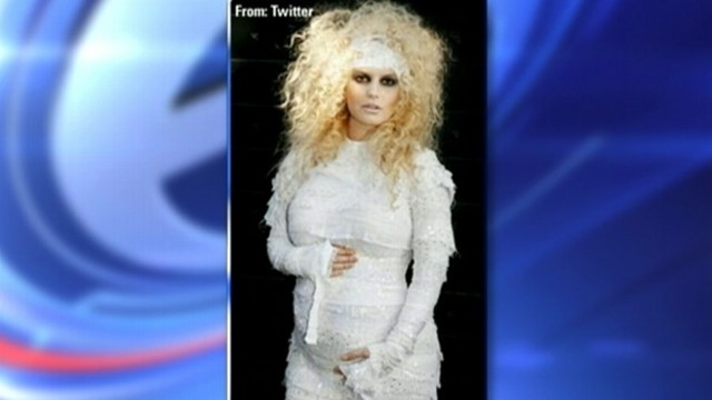 VIDEO: Singer announced her pregnancy in revealing her Halloween costume.
