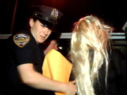 PHOTO: Amanda Bynes is taken to the police station after her arrest,  May 23, 2013.