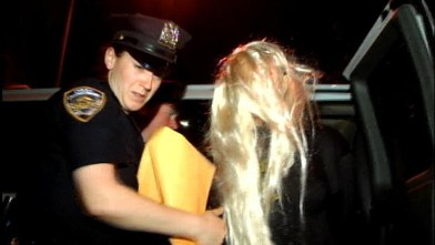 PHOTO: Amanda Bynes is taken to the police station after her arrest,  May 23, 2013.