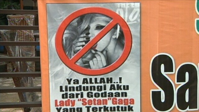 VIDEO: Lady Gagas show is pulled as the singer is called Satan by Muslim protesters.