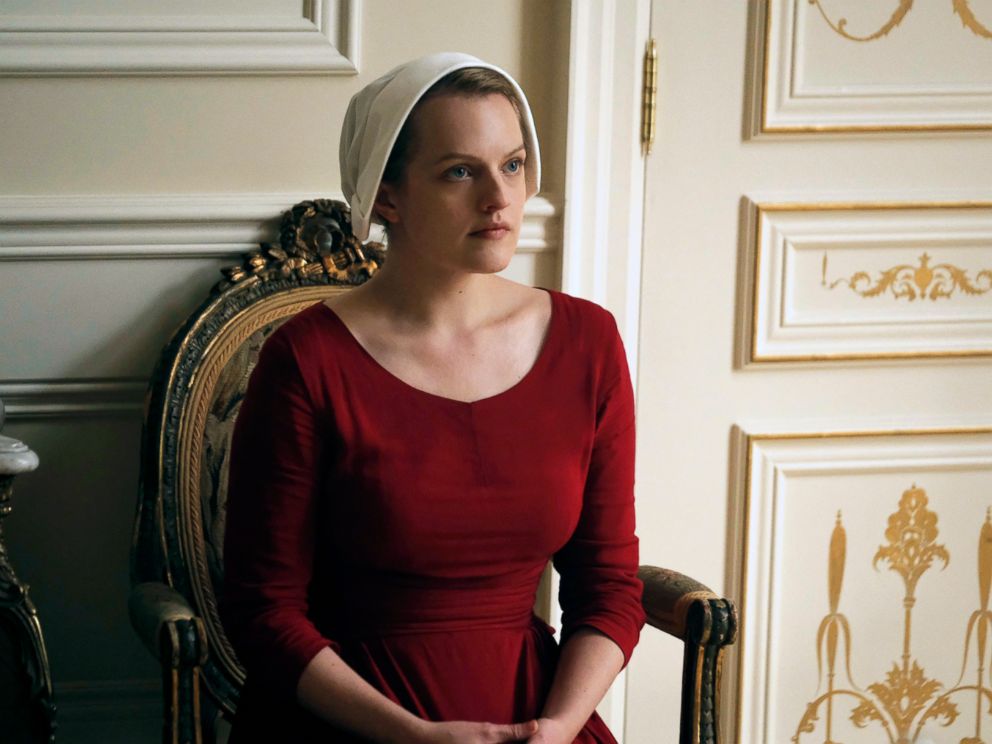 PHOTO: This image released by Hulu shows Elisabeth Moss as Offred in a scene from, The Handmaids Tale, premiering Wednesday on Hulu with three episodes. The remaining seven hours will be released each Wednesday thereafter.