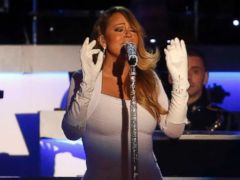 PHOTO: Mariah Carey performs at the National Christmas Tree lighting ceremony across from the White House in Washington, Friday, Dec. 6, 2013.