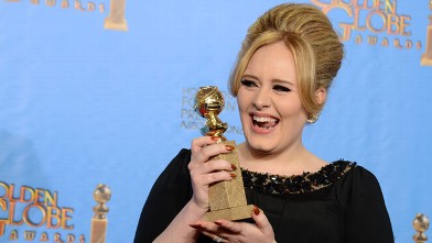 PHOTO: Adele poses with the award for best original song in a motion picture for "Skyfall" backstage at the 70th Annual Golden Globe Awards at the Beverly Hilton Hotel, Jan. 13, 2013, in Beverly Hills, Calif.