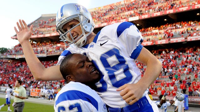 PHOTO: Middle Tennessee State kicker Alan Gendreau, right, is carried off the field by offensive guard Evon Lettsome (62) as he celebrates their win, in College Park, Md., Sept. 19, 2009.
