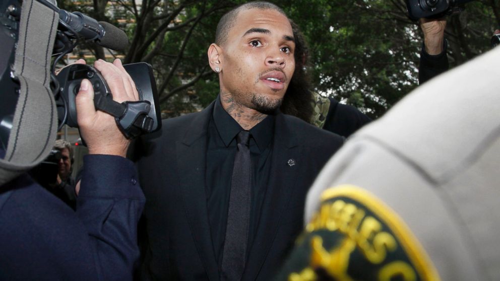 PHOTO: Singer Chris Brown arrives at court for a probation review hearing, Nov. 20, 2013, in Los Angeles.