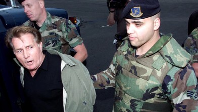 PHOTO: Actor Martin Sheen is arrested by Vandenberg Air Force Security Police at Vandenberg Air Force Base, Calif., Oct. 7, 2000.