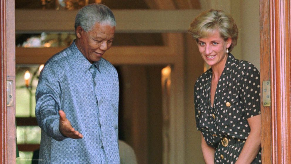 PHOTO: In this March 17, 1997 file photo, South African President Nelson Mandela, left, shows the way to Britains Princess Diana in Cape Town, South Africa, where they discussed the threat of AIDS in the country.