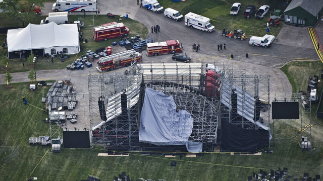 PHOTO: This aerial view shows a collapsed concert stage being set up for a concert by band Radiohead at Downsview Park in Toronto, Saturday, June 16, 2012.