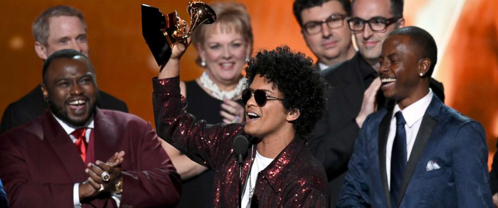 PHOTO:Bruno Mars accepts Album of the Year for 24K Magic with production team onstage during the 60th Annual GRAMMY Awards at Madison Square Garden, Jan. 28, 2018, in New York City.