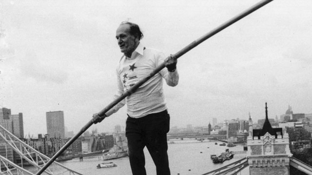 PHOTO: Karl Wallenda walks a tightrope from two corners of the Tower Hotel with Tower Bridge in the background, Nov. 23, 1976.