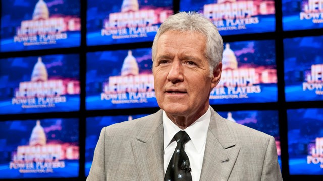 PHOTO: Alex Trebek speaks during a rehearsal before a taping of Jeopardy! Power Players Week at DAR Constitution Hall on April 21, 2012 in Washington, DC.