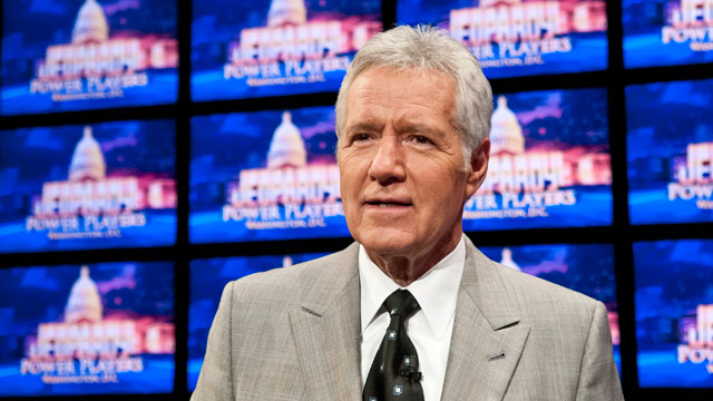 PHOTO: Alex Trebek speaks during a rehearsal before a taping of Jeopardy! Power Players Week at DAR Constitution Hall on April 21, 2012 in Washington, DC.