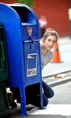 Katie Holmes Plays in a Fountain on Set 