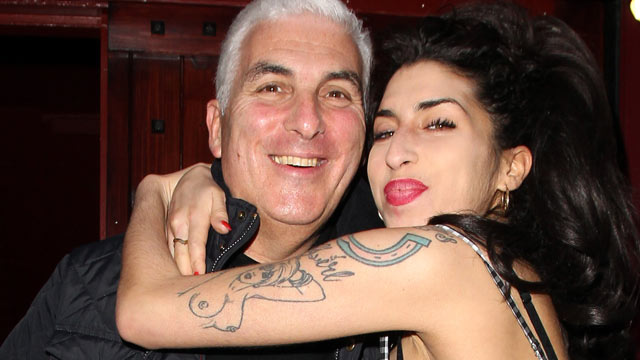 PHOTO: Amy Winehouse and her father Mitch Winehouse sighted outside Cityburlesque where her father was playing a gig on Oct. 7, 2010 in London, England.