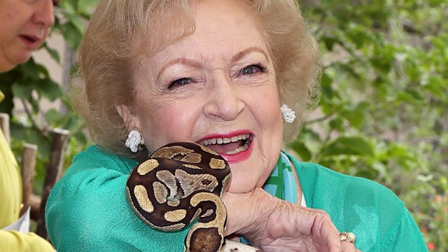 Betty White Hugs Snake for Charity