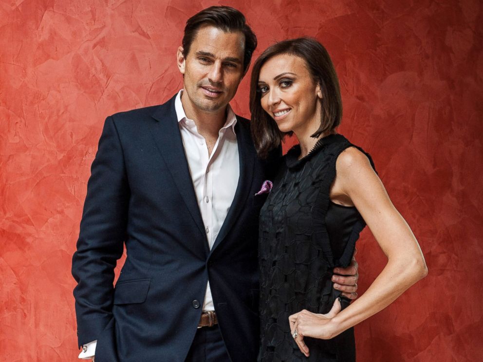 PHOTO: Bill and Giuliana Rancic pose for a portrait at the 2013 Columbus Day luncheon, Oct. 14, 2013, in Washington.