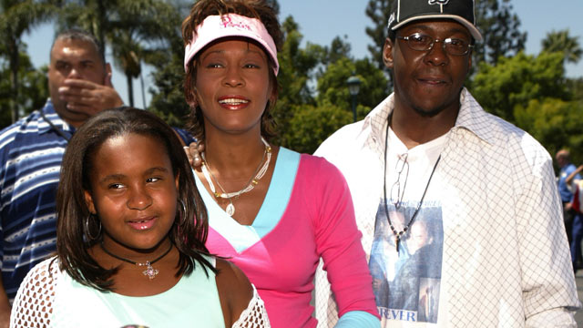 PHOTO: Whitney Houston, Bobby Brown and their daughter Bobbi Kristina, (left), August, 2004.