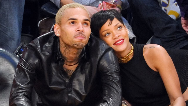 PHOTO: Chris Brown, left, and Rihanna attend a basketball game between the New York Knicks and the Los Angeles Lakers at Staples Center, Dec. 25, 2012 in Los Angeles, CA.