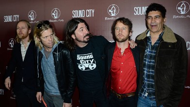 PHOTO: Musicians Nate Mendel, Taylor Hawkins, Dave Grohl, Chris Shiflett, and Pat Smear of Foo Fighters arrive at the Premiere Of "Sound City" at ArcLight Cinemas Cinerama Dome on January 31, 2013 in Hollywood, Calif.