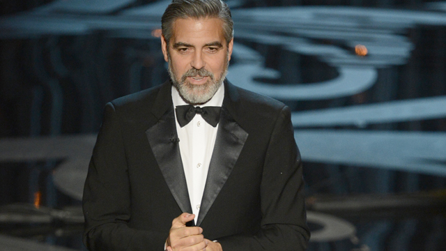 PHOTO: Actor/director George Clooney speaks onstage at the 85th Annual Academy Awards, Feb. 24, 2013 in Hollywood.