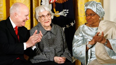 PHOTO: CEO of C-SPAN Brian Lamb, left, and Liberia President Ellen Johnson Sirleaf, right, applaud Pulitzer Prize winner "To Kill A Mockingbird" author Harper Lee.