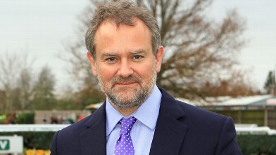 PHOTO: Hugh Bonneville attends the Hennessy Gold Cup at Newbury Racecourse in this Nov. 26, 2011 file photo in London, England.
