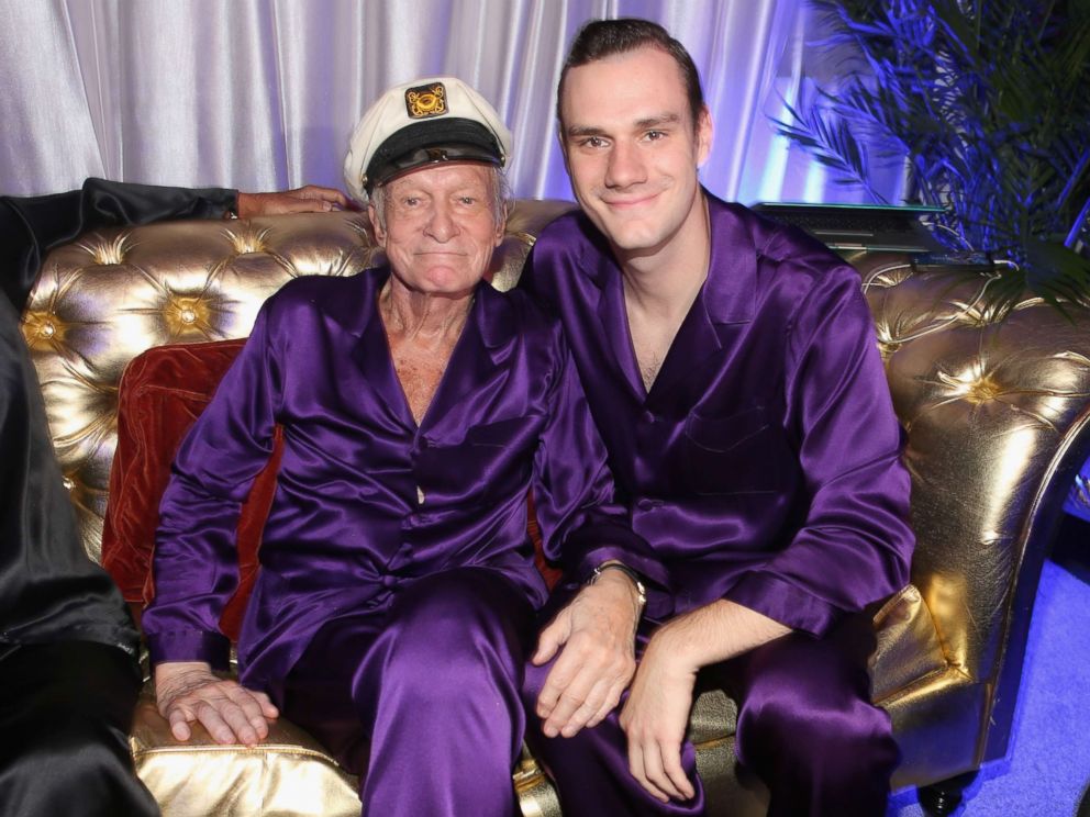 PHOTO: Hugh Hefner and Cooper Hefner attend the Annual Midsummer Nights Dream Party at the Playboy Mansion on Aug. 16, 2014 in Holmby Hills, California.