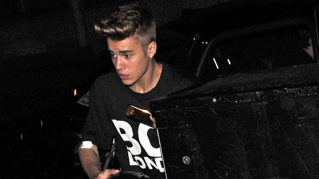 PHOTO: Justin Bieber returns to his hotel after having a check up at a hospital following collapsing during a performance at the O2 Arena, March 7, 2013, in London.