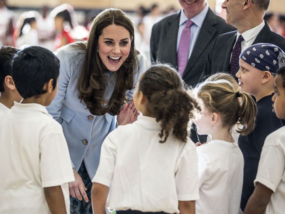 PHOTO: Catherine, Duchess of Cambridge talks to local school children after she arrived to open the new Kensington Leisure Centre on Jan. 19, 2015 in London, England.