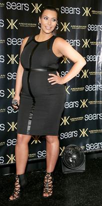 Kim Kardashian Ready to Pop in Tight Black Dress
