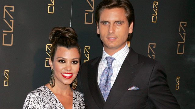 PHOTO: Kourtney Kardashian and Scott Disick attend the grand opening of RYU on April 23, 2012 in New York City.