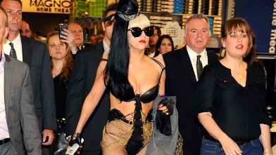 PHOTO: Lady Gaga signs copies of her album "Born This Way" at Best Buy on May 23, 2011 in New York City.