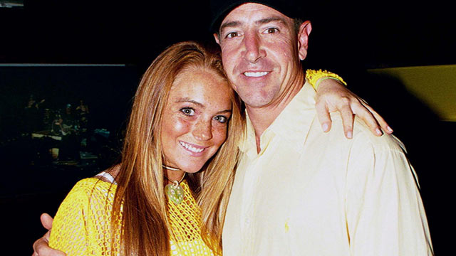 PHOTO: Lindsay Lohan and her father Michael Lohan pose at Billboard Live in Miami Beach on June 26, 2002.